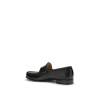 Loafer Slip-On Shoes by Valentino Garavani for men in buffalo & calf leather black & signature showcases a impeccable silhouette as V Logo Men's Buffalo & Calf Leather Loafer Slip-On Shoes, artfully designed with a impeccable and refined for a impeccable finish.