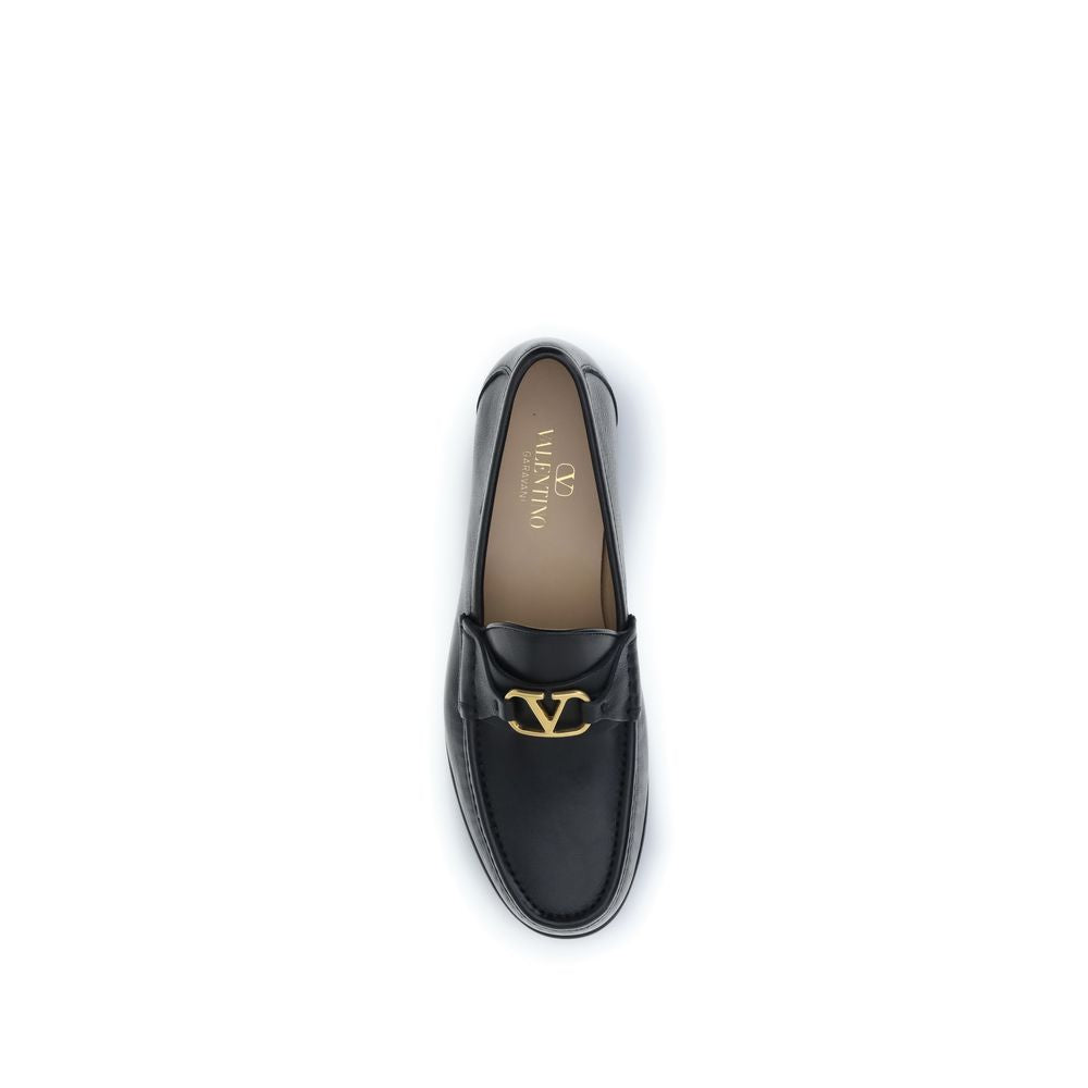 Loafer Slip-On Shoes by Valentino Garavani for men in buffalo & calf leather black & signature showcases a resplendent V Logo Men's Buffalo & Calf Leather Loafer Slip-On Shoes aesthetic, defined by its resplendent and elegant .