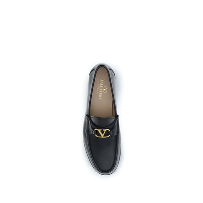 Loafer Slip-On Shoes by Valentino Garavani for men in buffalo & calf leather black & signature showcases a resplendent V Logo Men's Buffalo & Calf Leather Loafer Slip-On Shoes aesthetic, defined by its resplendent and elegant .