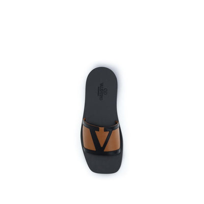 Flat Slider Sandals by Valentino Garavani for men in bos taurus calf leather and black & signature presents a captivating silhouette, showcasing the signature style of the Viva Superstar V Logo Men's Bos Taurus Calf Leather Flat Slider Sandals with a captivating flat and captivating .