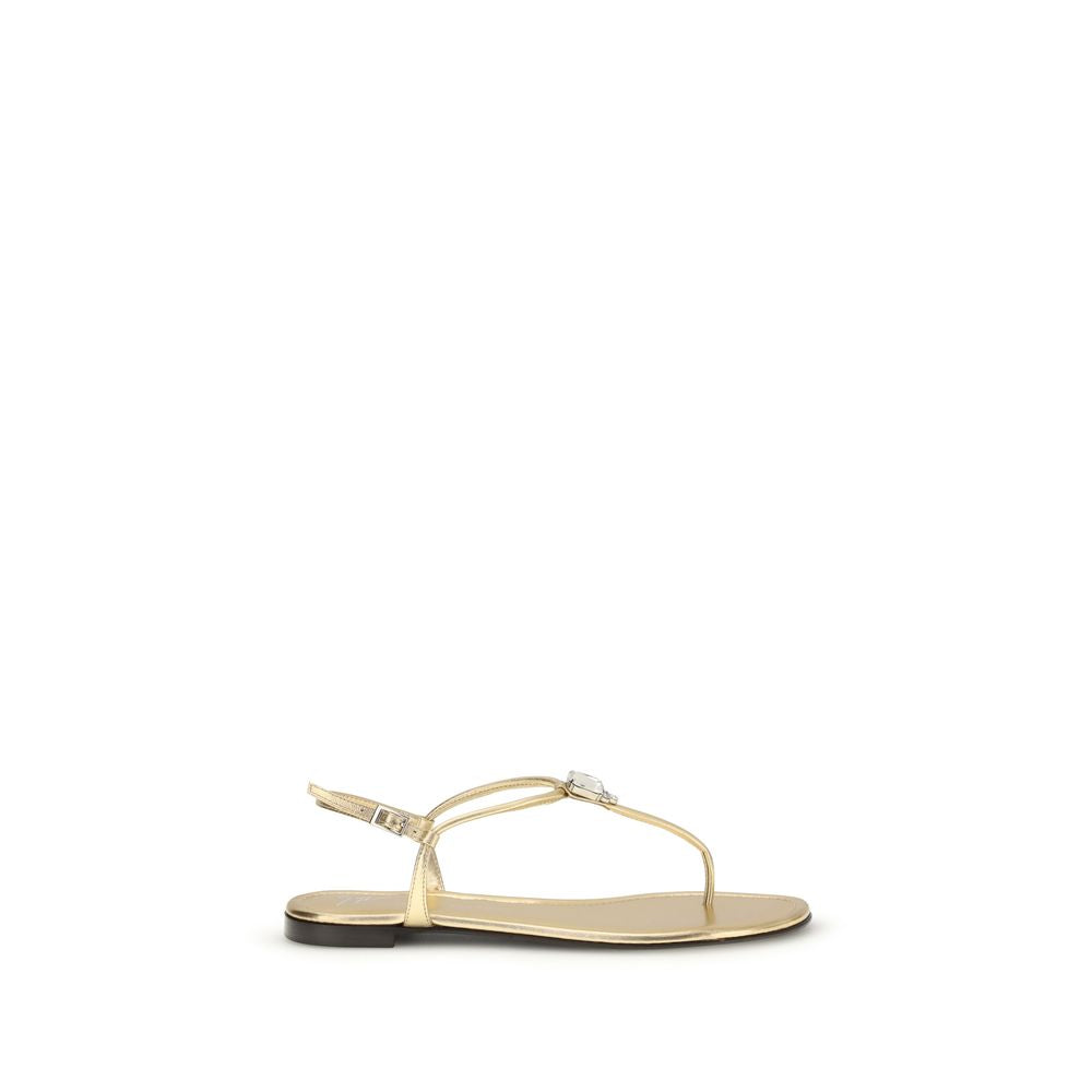 Flat Flip-Flop Sandals by Giuseppe Zanotti for women in bos taurus calf leather & rhinestone gold presents a sculptural silhouette, showcasing the Women's Bos Taurus Calf Leather & Rhinestone Flat Flip-Flop Sandals design with a sculptural flat and for a premium look.