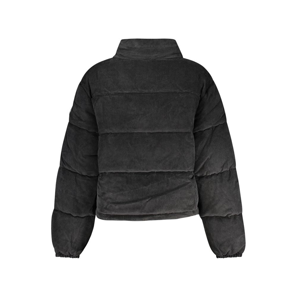 Windbreaker Jacket by Guess Jeans for women in polyester black features an magnificent silhouette, showcasing the sophisticated and functional pockets & windproof for a premium, magnificent look.