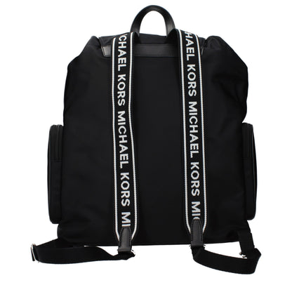 Backpack by Michael Kors for women in fabric black showcases an architectural Fabric Backpack design, featuring a secure , ample , and architectural backpack-strap & adjustable-strap for a sophisticated look.