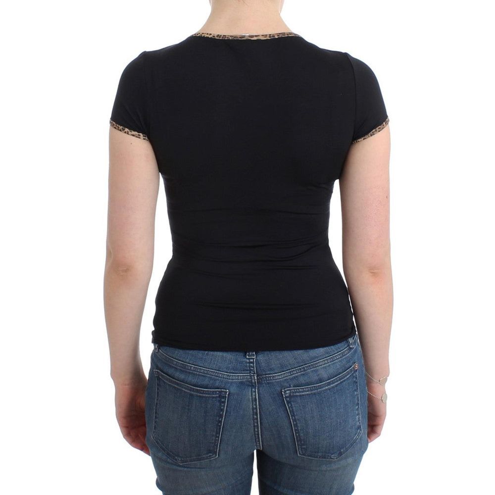 Activewear T-Shirt by Roberto Cavalli for women in stretch nylon black features a dynamic silhouette with and enhanced by functional .