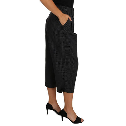 Pants by Dolce & Gabbana for women in virgin wool & cotton black, white & dots features a sleek silhouette with a sleek , a refined long, and a sophisticated finish.