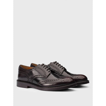 Brogue Brogues Shoes by Doucal's for men in leather brown showcases a impeccable silhouette as Men's Leather Brogue Brogues Shoes, artfully designed with a impeccable and refined for a impeccable finish.