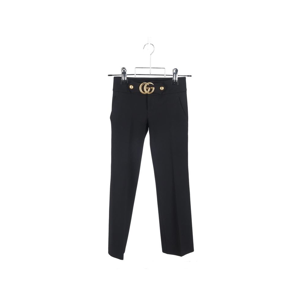 Trousers by Gucci for women in viscose black features a artisanal silhouette, showcasing a sophisticated wide with a long and for a artisanal finish.