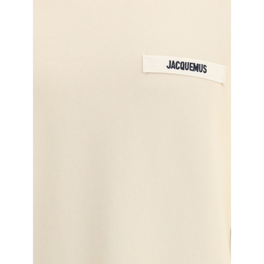Sweatshirt Hoodie by Jacquemus for men in cotton beige & signature features an dramatic silhouette, showcasing a sophisticated and dramatic for a refined, modern aesthetic.