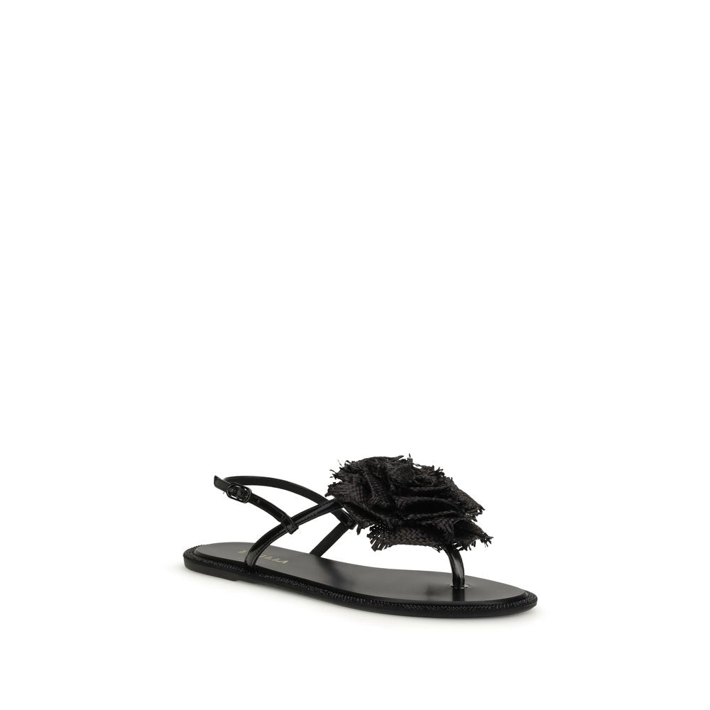 Flat Flip-Flop Sandals by LE SILLA for women in bos taurus calf leather black & rose presents a sculptural silhouette, showcasing the Women's Bos Taurus Calf Leather Flat Flip-Flop Sandals design with a sculptural flat and for a premium look.