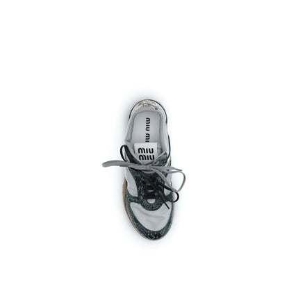 Athletic Sneakers by Miu Miu for women in python leather animal, gray & print presents a sleek silhouette, perfectly capturing the athletic style essence of Women's Athletic Python Leather Sneakers with its sleek design and premium finish.