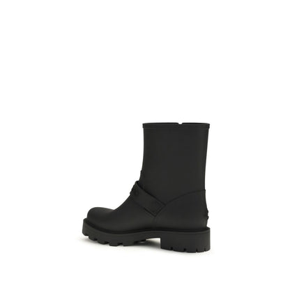Rain Boots by Jimmy Choo for women in tu & polyurethane black showcases a impeccable silhouette as Women's TU & Polyurethane Rain Boots, artfully defined by a impeccable and a impeccable .