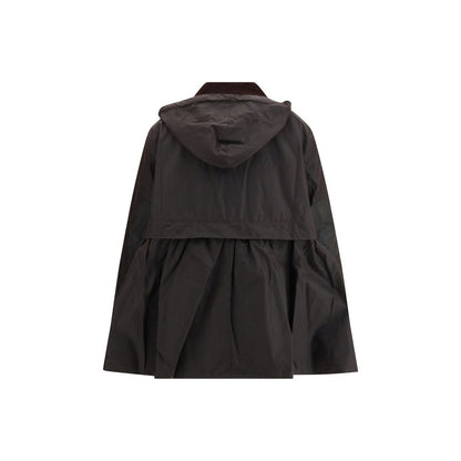 Overcoat by Barbour for women in cotton polyester brown & tartan features a cosy chic silhouette, artfully detailed with a sophisticated and premium for a cosy chic finish.