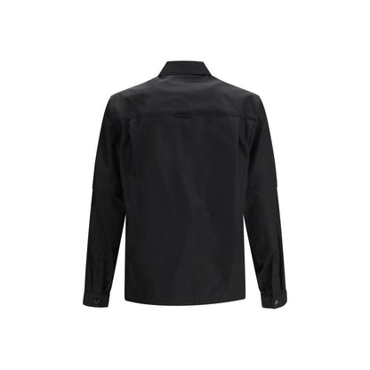 Jacket by Prada for men in polyamide plastic textile black features an utilitarian silhouette with a refined , showcasing sophisticated pockets for an utilitarian aesthetic.
