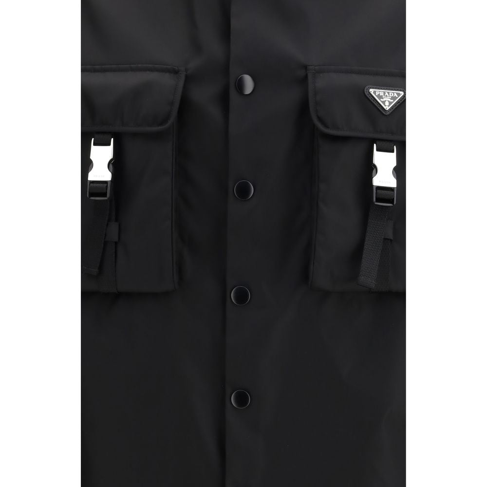 Jacket by Prada for men in polyamide plastic textile black presents a impeccable silhouette, showcasing distinct pockets and a impeccable for a sophisticated finish.