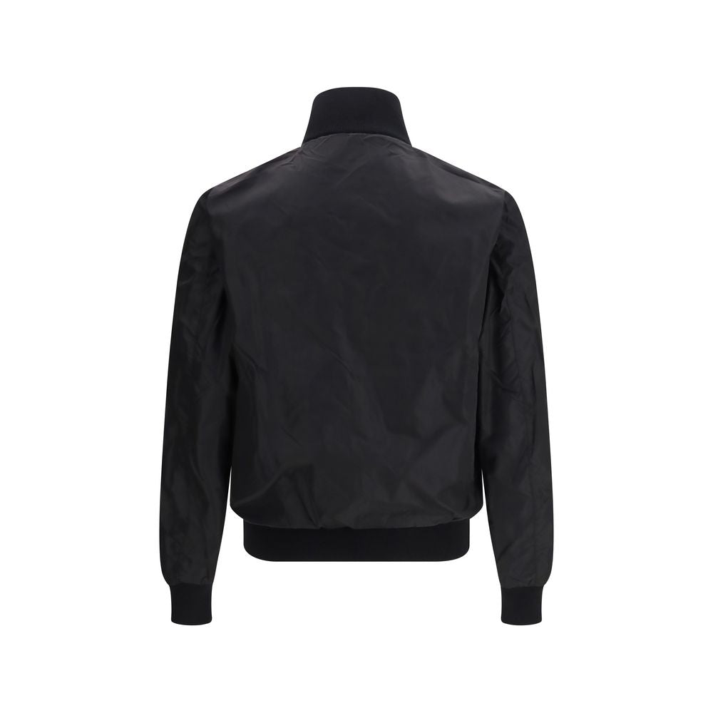 Bomber Jacket by Prada for men in virgin wool & polyamide black & signature features a city-ready silhouette, detailed with pockets and a city-ready stand-collar neckline.