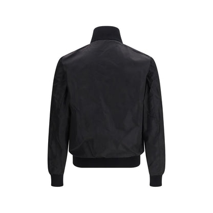 Bomber Jacket by Prada for men in virgin wool & polyamide black & signature features a city-ready silhouette, detailed with pockets and a city-ready stand-collar neckline.