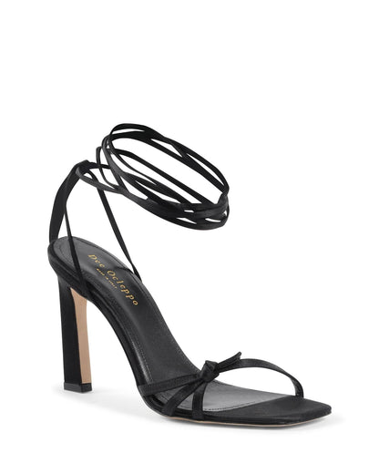 High-Heel Sandals by Dee Ocleppo for women in satin black showcases a sculptural silhouette as Women's Satin High-Heel Sandals, defined by a sculptural 10-cm-heel high-heel and sculptural for a sculptural look.