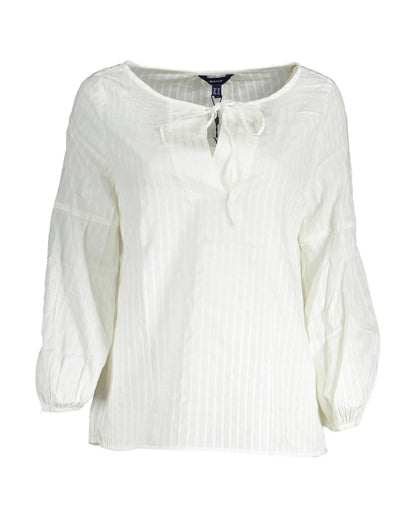 Blouse by Gant for women in lyocell & cotton white showcases a sleek silhouette, elegantly detailed with a sleek v-neck neckline and long-sleeve for a sleek finish.