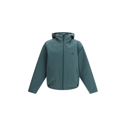 Windbreaker Jacket by Gucci for men in cotton polyester bicolour, dark-green & signature presents a resilient silhouette, artfully detailed with a sophisticated hooded high-collar neckline and functional pockets, hooded & windproof for a resilient finish.