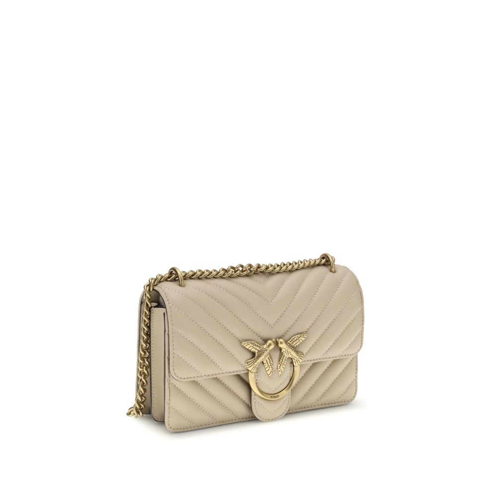 Mini 2-in-1 Shoulder & Crossbody Quilted Bag by PINKO for women in bos taurus calf leather beige, gold & monogram features an effortlessly chic silhouette with a secure magnetic & button, ample , and versatile crossbody-strap & shoulder-strap for effortlessly chic everyday luxury.