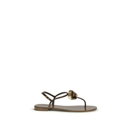 Flat Thong Sandals by Giuseppe Zanotti for women in leather & stainless steel brown presents a sculptural silhouette, showcasing the Women's Leather & Stainless Steel Flat Thong Sandals design with a sculptural flat and for a premium look.