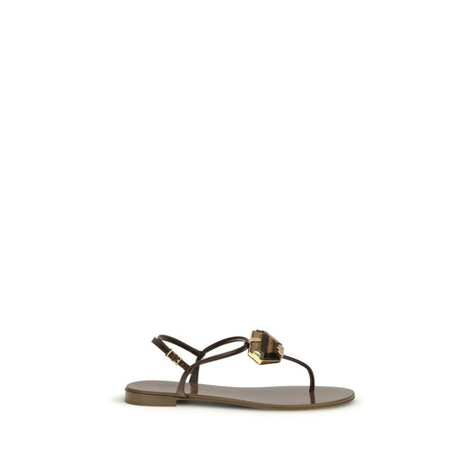 Flat Thong Sandals by Giuseppe Zanotti for women in leather & stainless steel brown presents a sculptural silhouette, showcasing the Women's Leather & Stainless Steel Flat Thong Sandals design with a sculptural flat and for a premium look.
