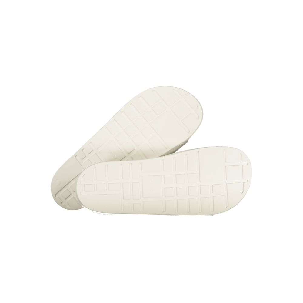 Sandals by Calvin Klein for men in polyester & polyurethane white features an architectural design from the Crisp Men's Polyester & Polyurethane Sandals collection, defined by a architectural and for a architectural finish.
