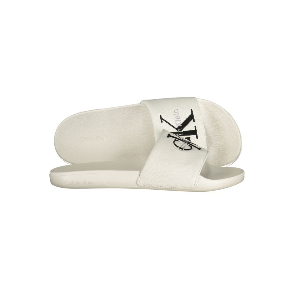 Sandals by Calvin Klein for men in polyester & polyurethane white features an architectural silhouette, showcasing the architectural Crisp Men's Polyester & Polyurethane Sandals with a and .