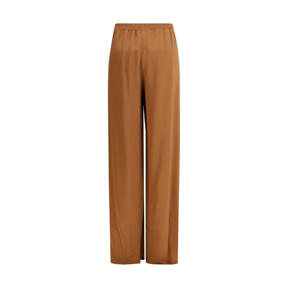 Trousers by Fabiana Filippi for women in viscose acetate beige features an sartorial silhouette, showcasing a precise straight & regular-fit and long with a sartorial high rise for a refined look.
