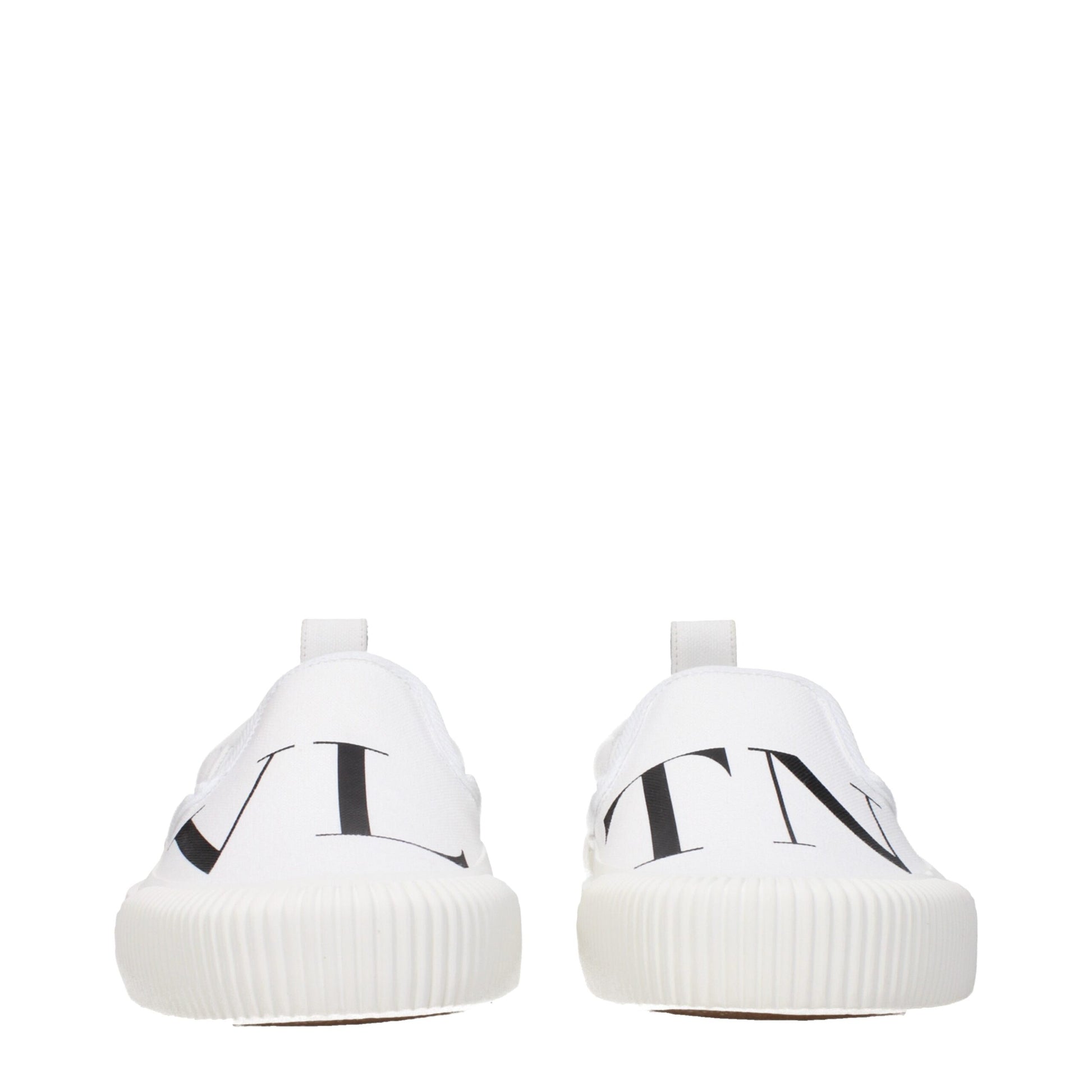 Flat Loafer Slip-On Shoes by Valentino Garavani for men in rubber & fabric white features an effortless chic silhouette, showcasing the Men's Rubber & Fabric Flat Loafer Slip-On Shoes design with an effortless chic flat and a round toe style for a effortless chic look.