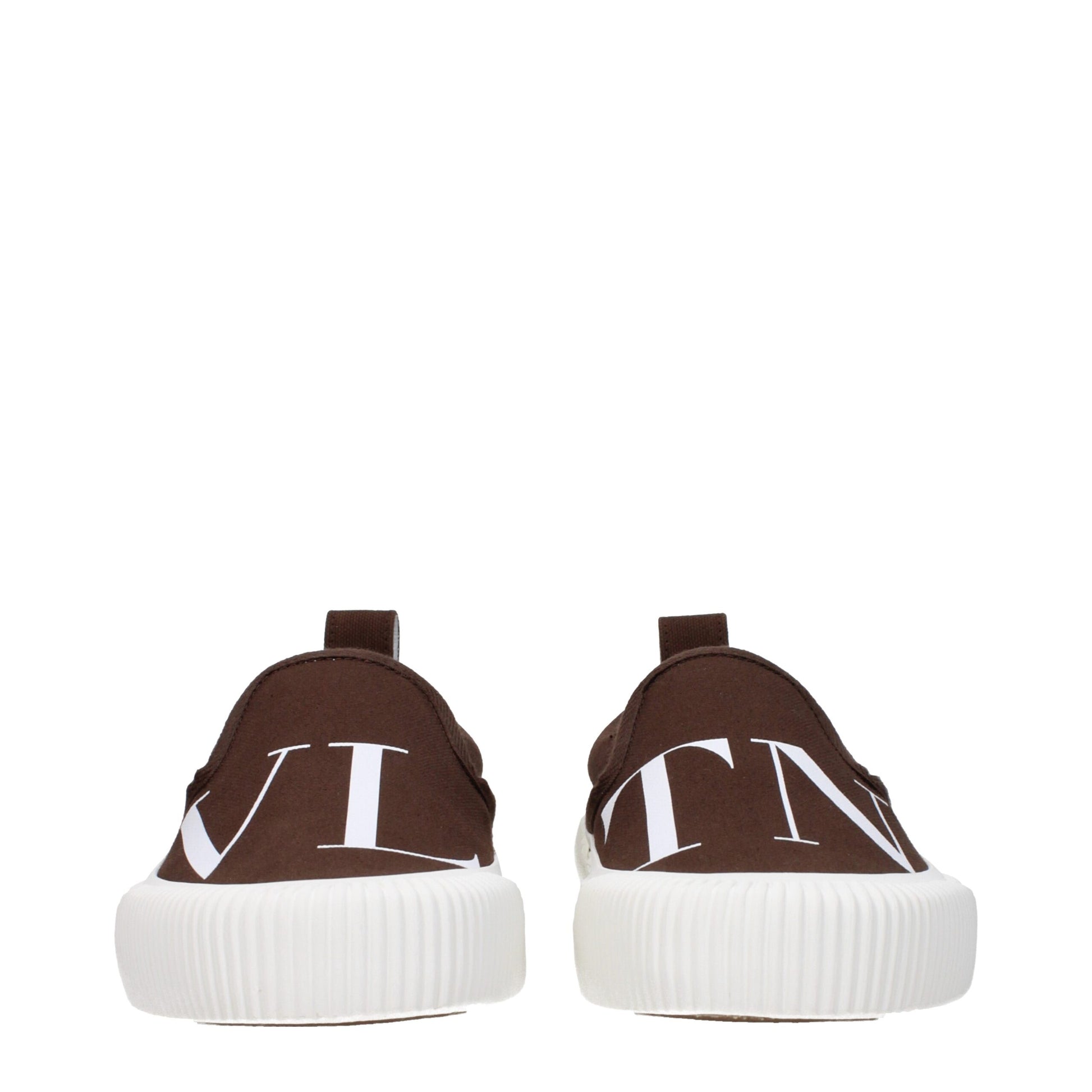 Flat Loafer Slip-On Shoes by Valentino Garavani for men in rubber & fabric brown showcases a timeless silhouette from the Men's Rubber & Fabric Flat Loafer Slip-On Shoes collection, featuring a timeless flat and round toe style for a timeless finish.