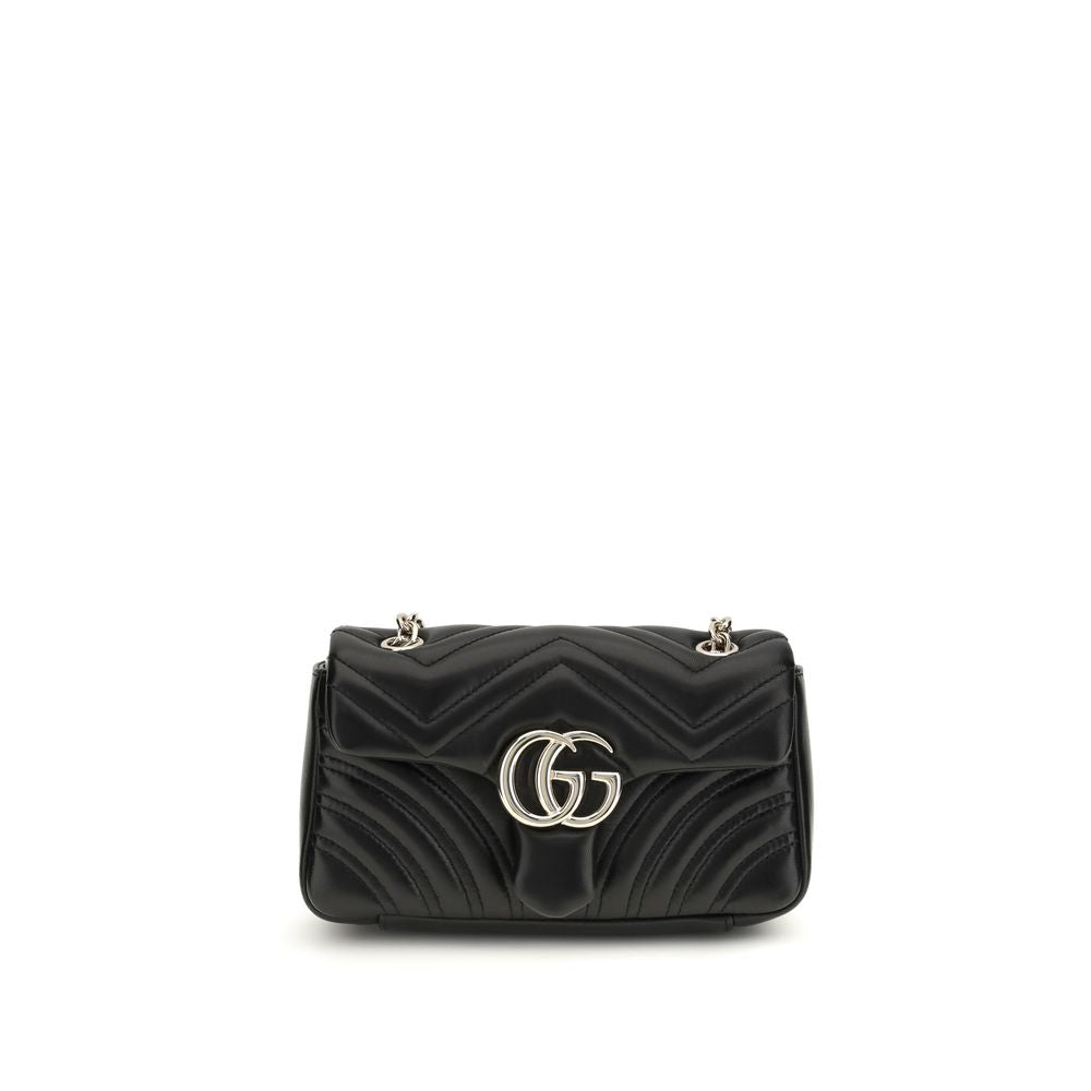 Small Shoulder Flap Bag by Gucci for women in bos taurus nappa leather black, gold, red, patterned & chevron features a effortless chic silhouette with a secure flap, ample , and versatile shoulder-strap for a effortless chic finish.