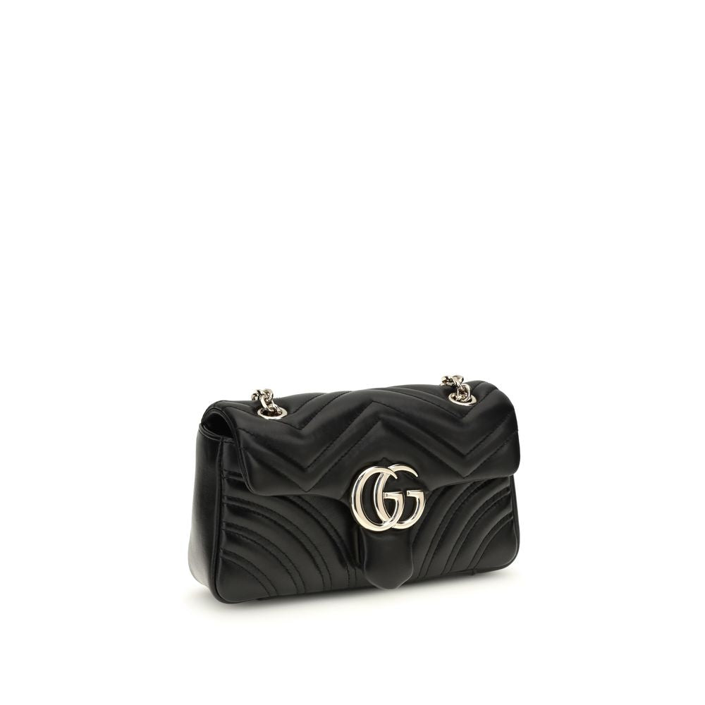 Small Shoulder Flap Bag by Gucci for women in bos taurus nappa leather black, gold, red, patterned & chevron features a distinguished silhouette, showcasing a secure flap and distinguished with versatile shoulder-strap for a distinguished finish.