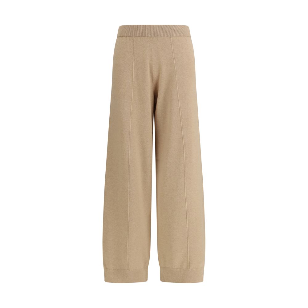Trousers by Fabiana Filippi for women in cashmere silk & capra leather beige presents a perennial silhouette, meticulously tailored with a straight-leg, regular-fit & wide cut, long finish, and an elegant .