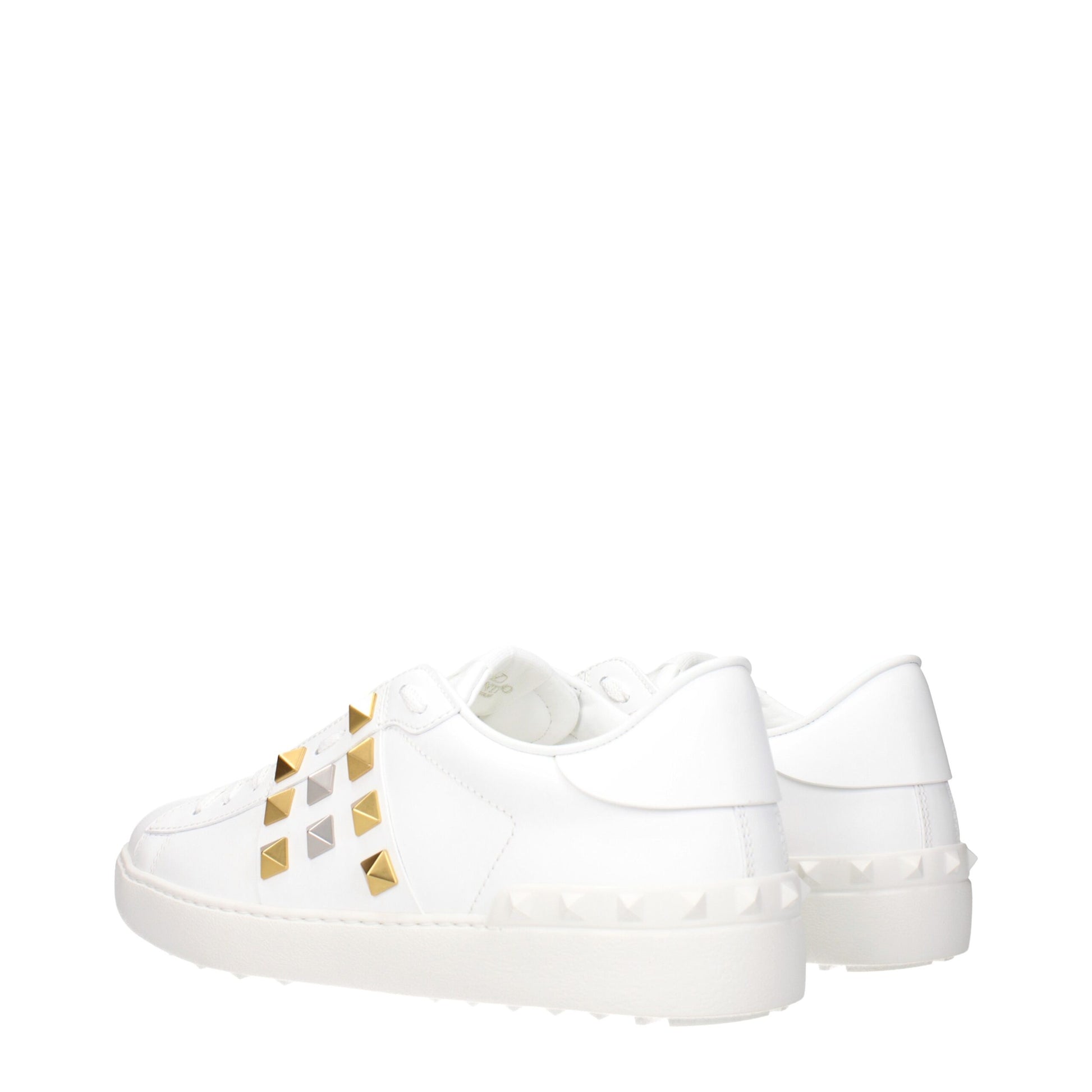 Sneakers by Valentino Garavani for men in leather & rubber white presents a sumptuous silhouette, artfully capturing the essence of the Men's Low Top Leather & Rubber Sneakers with its sumptuous low-top style design.