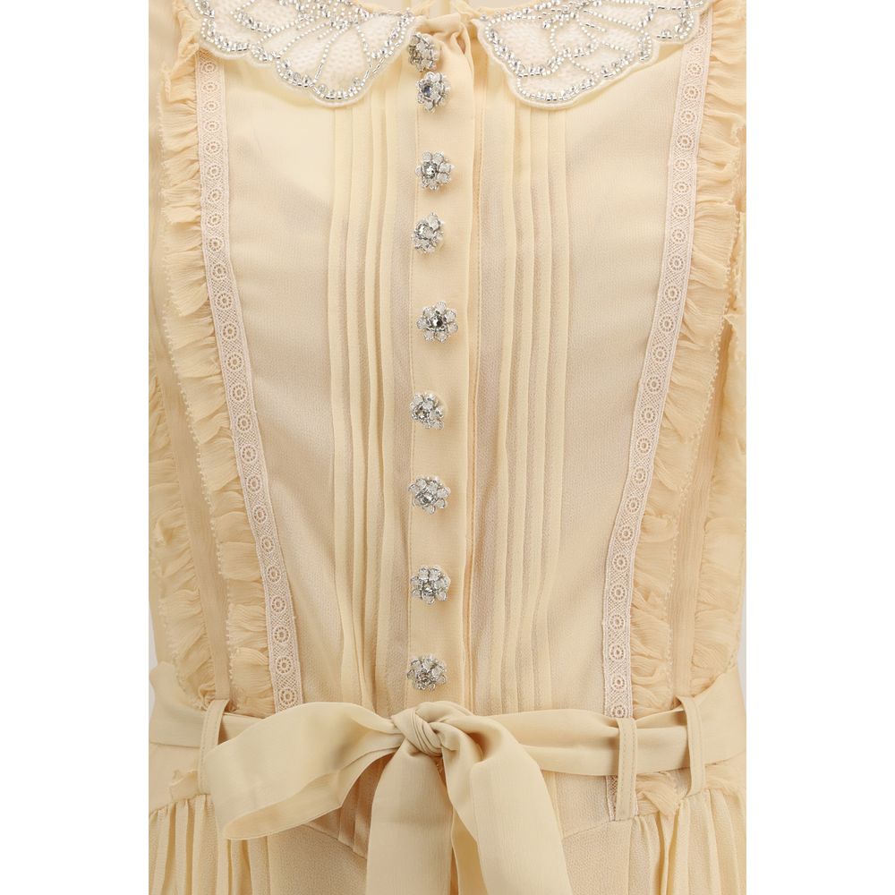 Dress by Self-Portrait for women in polyester & viscose cream features an magnificent silhouette, artfully detailed with a magnificent and that flows into an magnificent short mini.