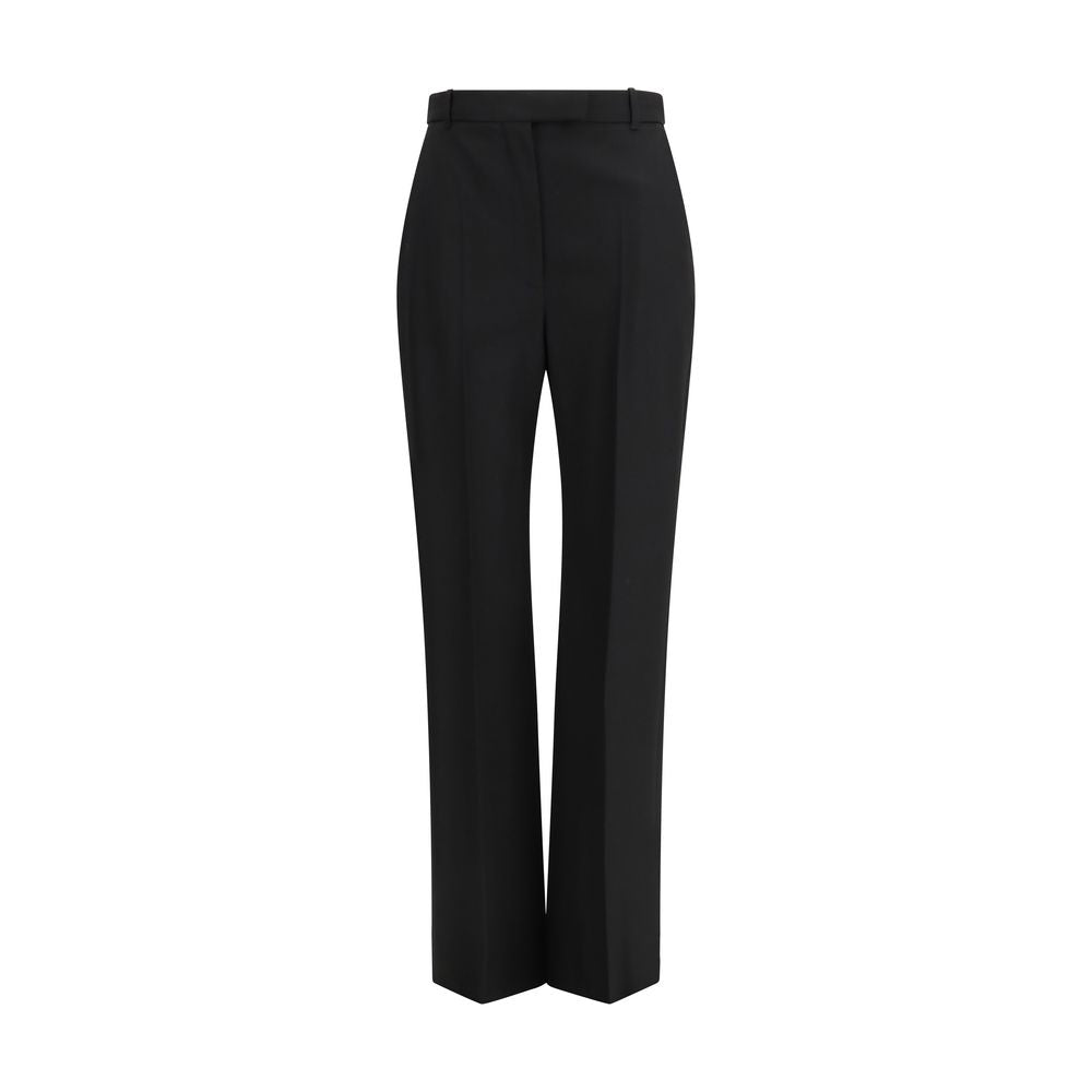 Trousers by Alexander McQueen for women in cotton black features a tailored silhouette with a tailored straight-leg & regular-fit, defined by its long and a sophisticated .