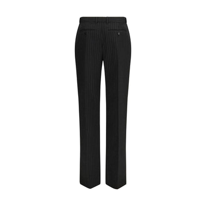 Trousers by Alexander McQueen for women in wool black, patterned & pinstripe features a tailored silhouette with a tailored regular-fit, defined by its long and a sophisticated .
