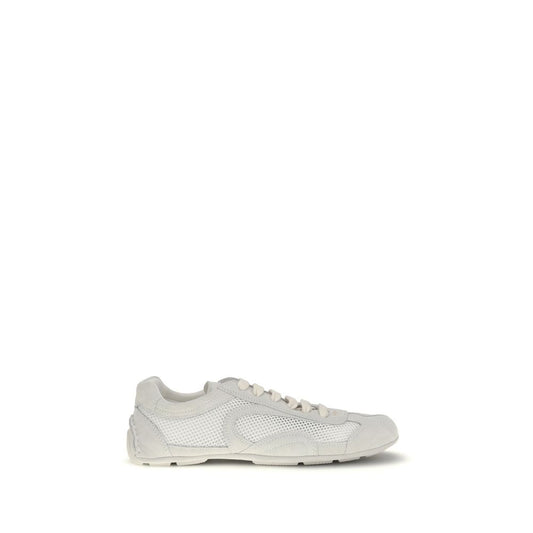 Sneakers by Prada for women in bos taurus suede calf leather white presents a impeccable silhouette as Women's Low Top Bos Taurus Suede Calf Leather Sneakers, expertly defined by a impeccable low-top style for a impeccable, high-fashion look.