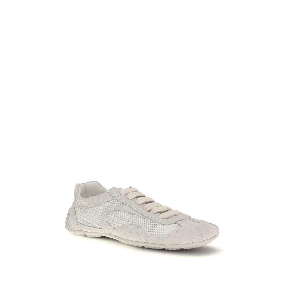 Sneakers by Prada for women in bos taurus suede calf leather white features a chic design, perfectly showcasing the chic low-top style of this Women's Low Top Bos Taurus Suede Calf Leather Sneakers.