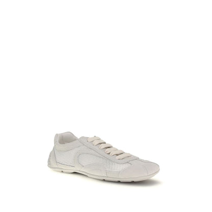 Sneakers by Prada for women in bos taurus suede calf leather white features a chic design, perfectly showcasing the chic low-top style of this Women's Low Top Bos Taurus Suede Calf Leather Sneakers.