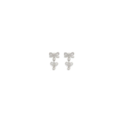 Earrings by Self-Portrait for women in bos taurus calf suede leather pearl & silver showcases a enchanting silhouette, artfully incorporating the intricate seen in the Women's Silver Brass & Pearls Earrings.