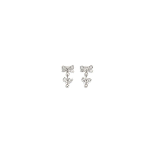 Earrings by Self-Portrait for women in bos taurus calf suede leather pearl & silver showcases a enchanting silhouette, artfully incorporating the intricate seen in the Women's Silver Brass & Pearls Earrings.