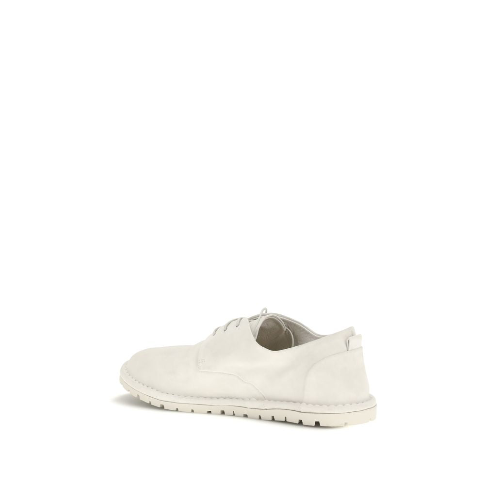 Lace-Up Shoes by Marsell for men in bos taurus calf suede leather beige showcases a impeccable silhouette as Men's Bos Taurus Calf Suede Leather Lace-Up Shoes, artfully designed with a impeccable and refined for a impeccable finish.