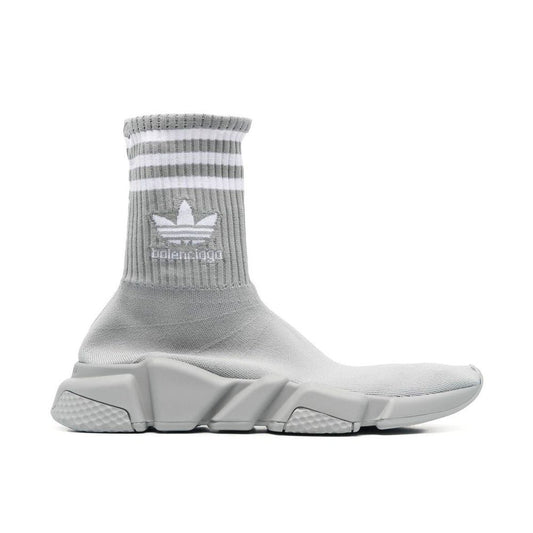 Athletic Sneakers by BALENCIAGA X ADIDAS for women in nylon gray presents a sleek silhouette, perfectly capturing the athletic style essence of Women's Athletic Nylon Sneakers with its sleek design and premium finish.