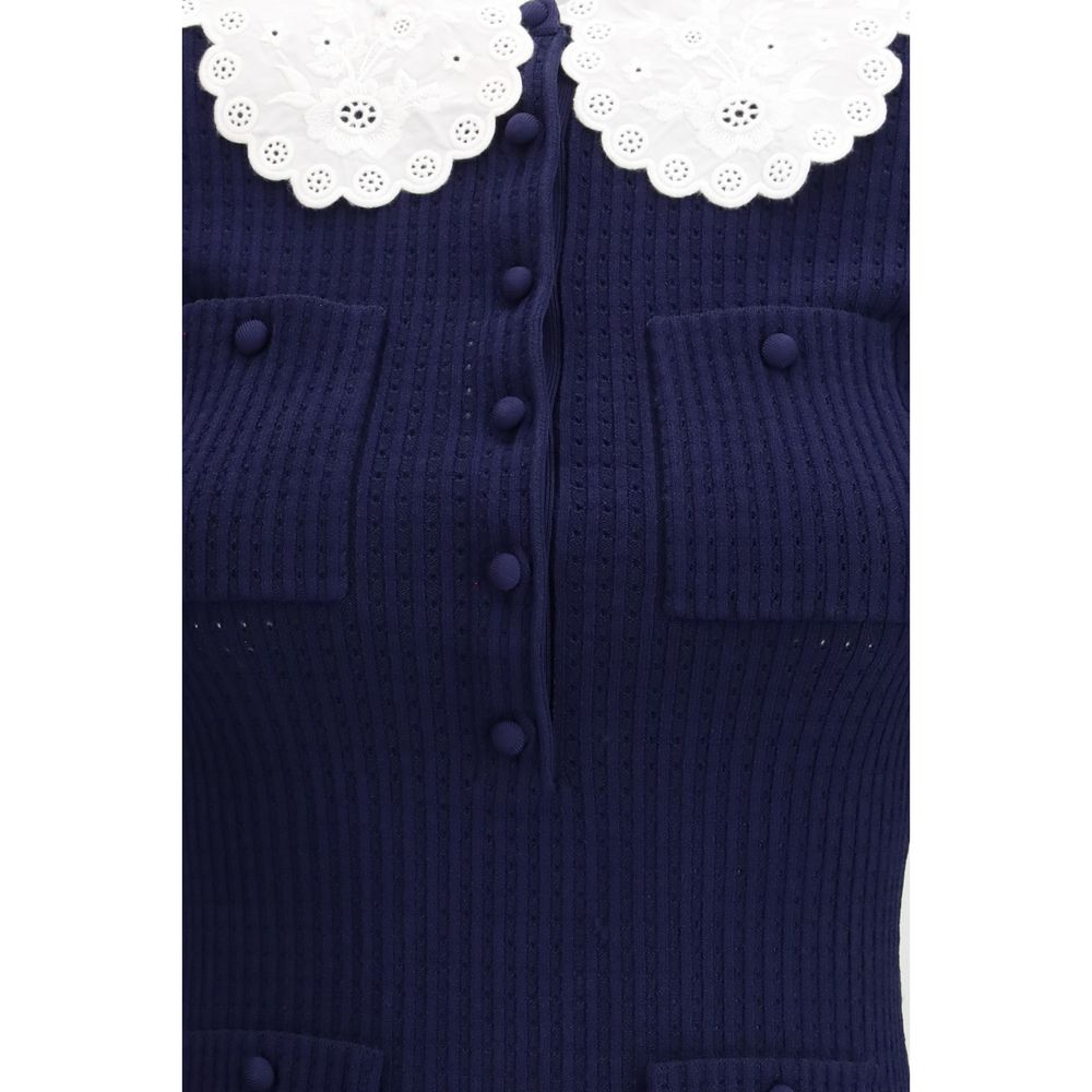 Dress by Self-Portrait for women in polyamide polyester & viscose blue & patterned features an magnificent silhouette, artfully detailed with a magnificent and that flows into an magnificent short mini.