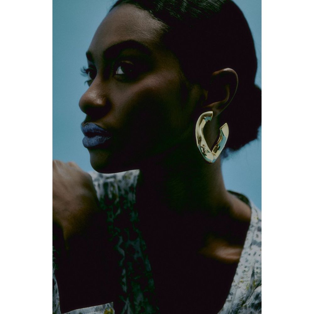 Earrings by Patrizia Pepe for women in polyurethane gold showcases a captivating silhouette, featuring an captivating from the Women's Plastic & Gold Earrings collection for a captivating finish.