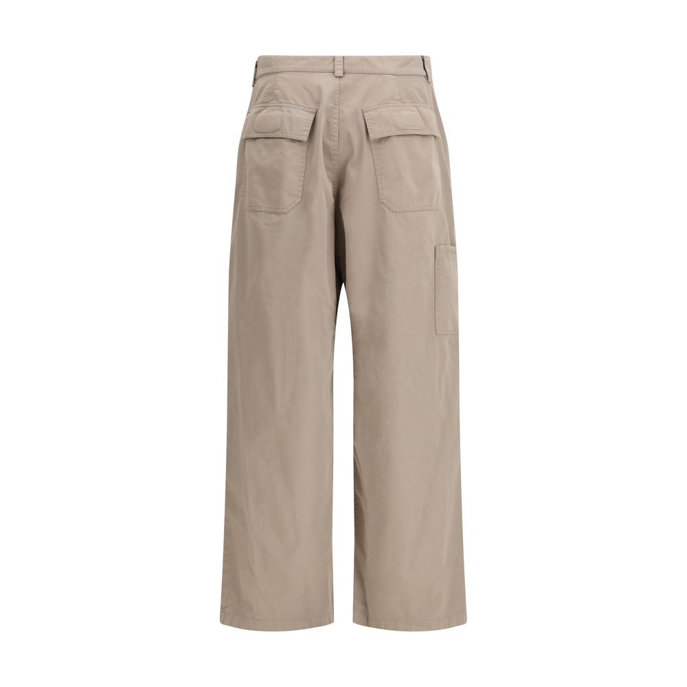 Trousers by Balenciaga for men in cotton twill beige & signature features an on trend silhouette, showcasing a sophisticated oversized with a long and for an on trend finish.