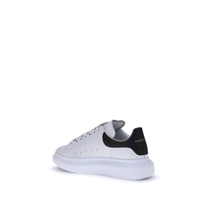 Sneakers by Alexander McQueen for men in bos taurus calf leather white presents a sumptuous silhouette, artfully capturing the essence of the Men's Fashion Bos Taurus Calf Leather Sneakers with its sumptuous fashion style design.