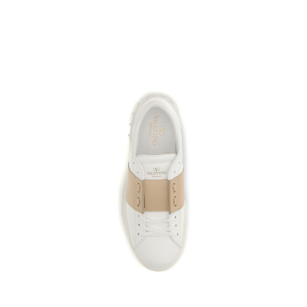 Sneakers by Valentino Garavani for men in bos taurus calf leather white presents a sumptuous silhouette, artfully capturing the essence of the Men's Low Top Slip On Bos Taurus Calf Leather Sneakers with its sumptuous low-top slip-on style design.